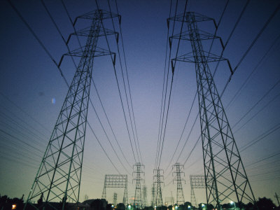 setting-sun-silhouettes-tall-high-tension-wire-towers