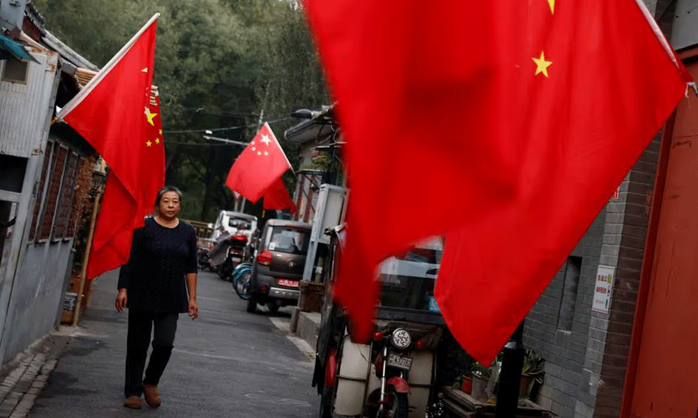 China says overall pressure on employment yet to ease