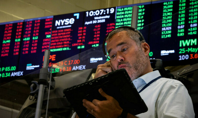 Wall St lower after Trump’s fresh tariffs at start of Fed-decision week