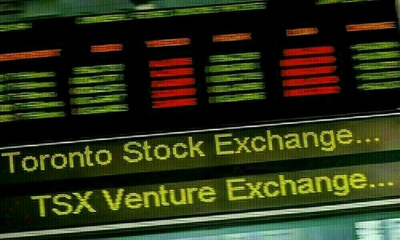 TSX flat as investors await trade updates