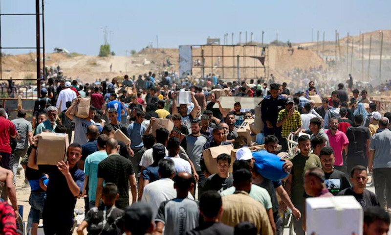 Aid trucks move from Egypt to Gaza after Israel said it began airdrops