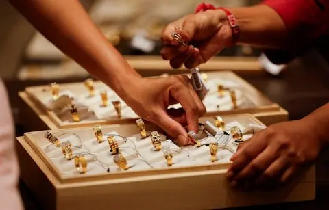 Gold set to snap nine-week winning streak as US inflation test looms