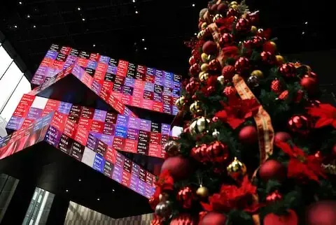 Stocks climb, oil volatile as investors assess Venezuela implications