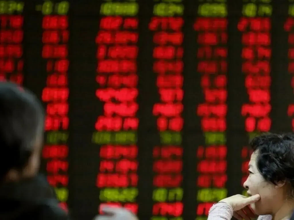 China stocks tumble as gold shares drag