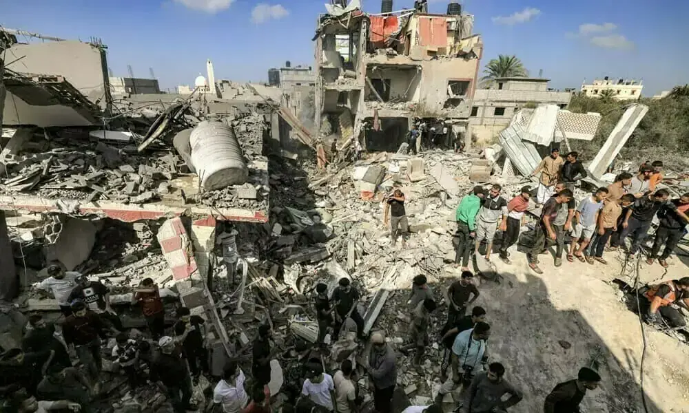 Gaza civil defence says 9 dead in strikes after Israel says shots wounded officer