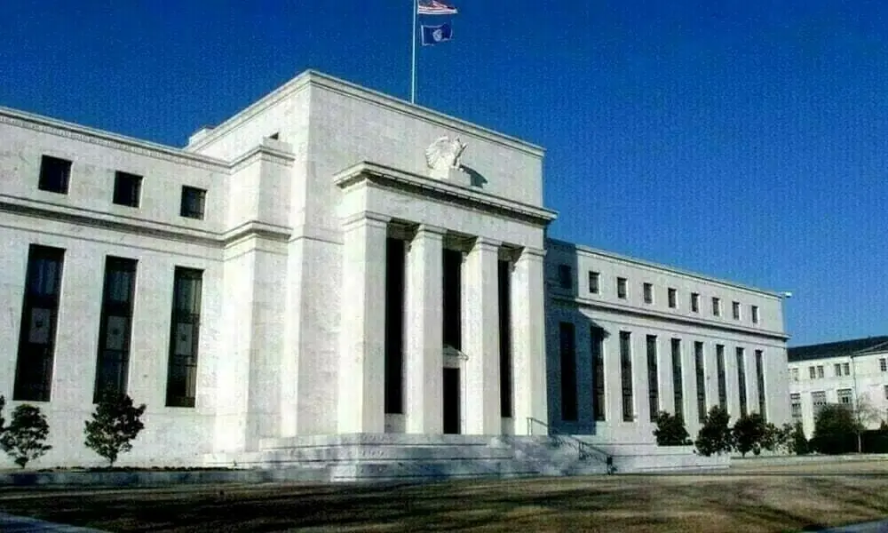 Fed says oil shock means getting inflation down takes longer