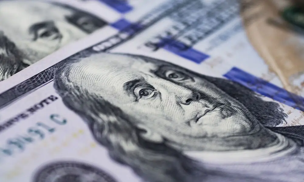 Rupee inches upward against US dollar
