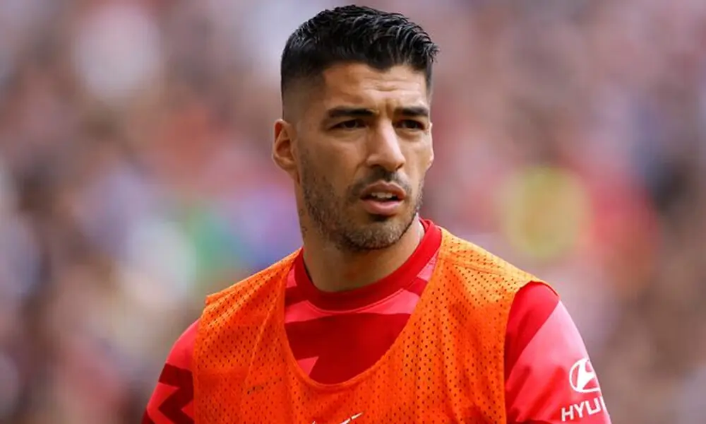 Suarez open to Uruguay return for World Cup
