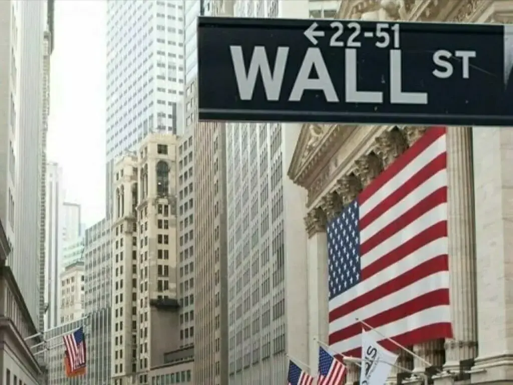 Wall St slips as oil jumps on renewed Mideast concerns