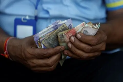 Indian rupee RBI-spurred relief rally to fade on Asia FX weakness, hedging