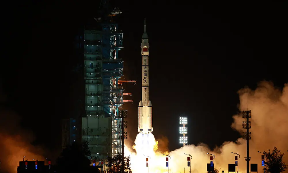 China launches three-crew space flight as part of Moon ambitions