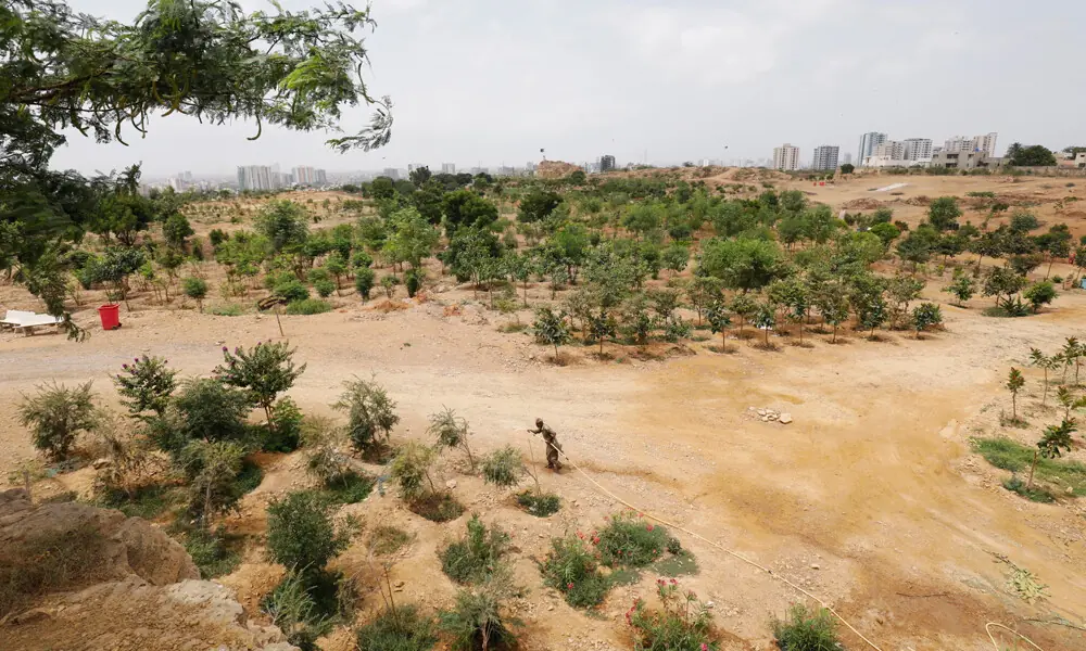 KMC halts work near Hill Park, approaches police over illegal land occupation