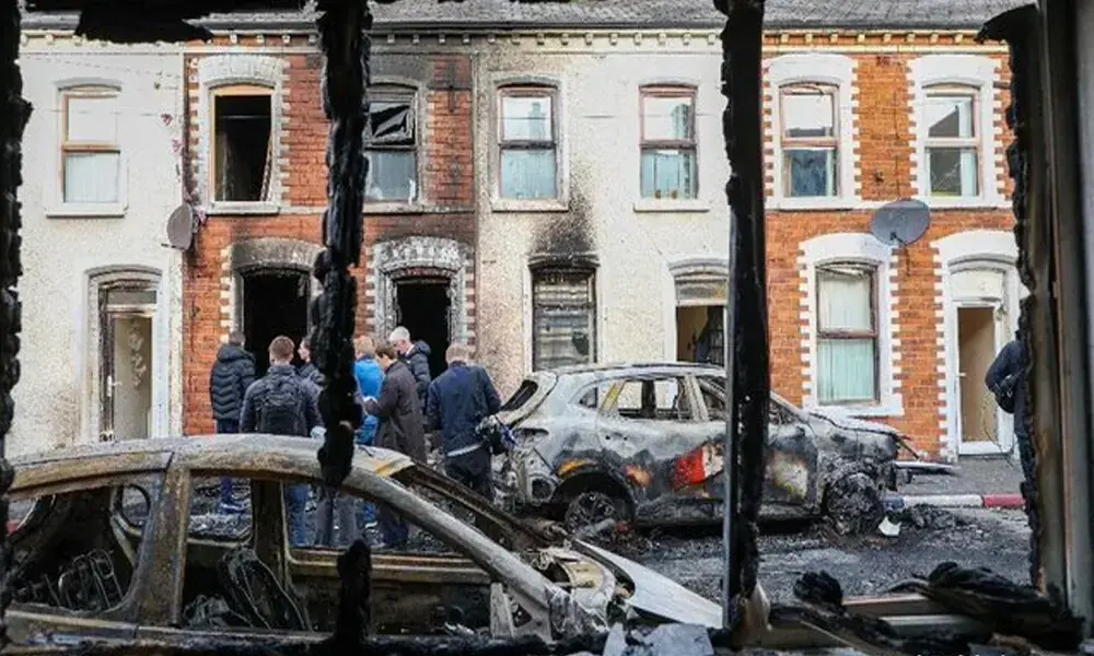 Thousands turn out for anti-racism rally after Belfast unrest