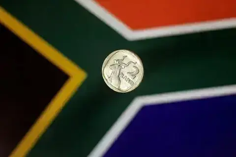 South African rand muted as firmer dollar weighs