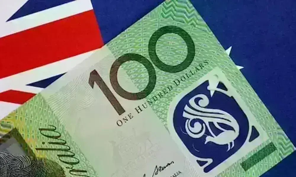 Australian dollar slips, bonds jump as inflation quashes rate risk