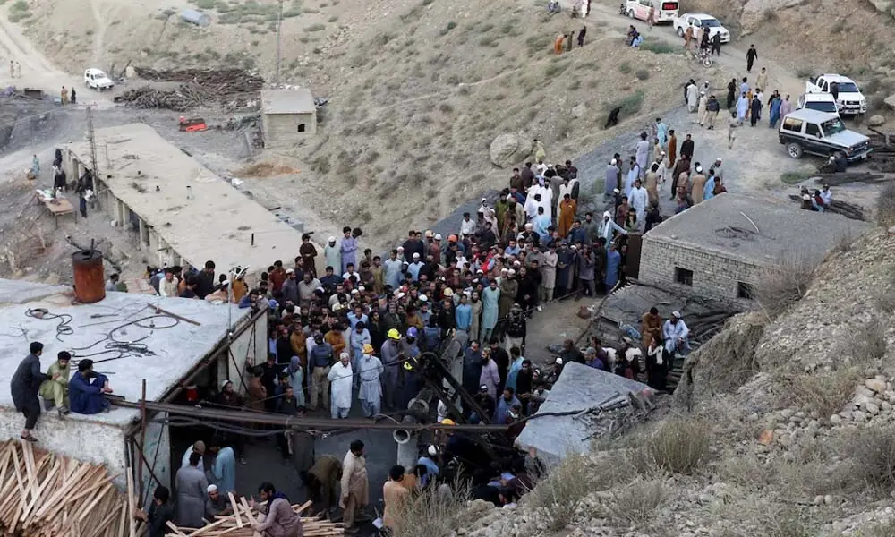 Coal mine complex blast kills 11, dozens missing
