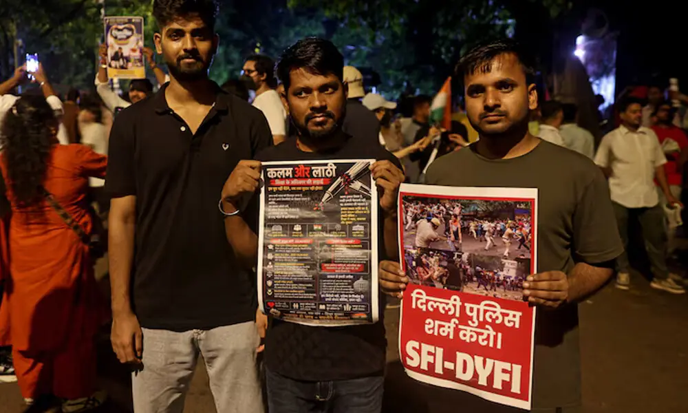 Ashok Kumar, right, attended demonstrations near New Delhi’s Jantar Mantar observatory. The 25-year-old said he was frustrated by the repeated mismanagement of India’s exam system. REUTERS