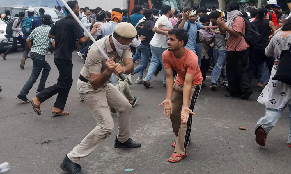 Protesters were met with baton-wielding police officers when they attempted to march toward parliament on July 20. More than 50,000 participated in the rally, according to some estimates. REUTERS