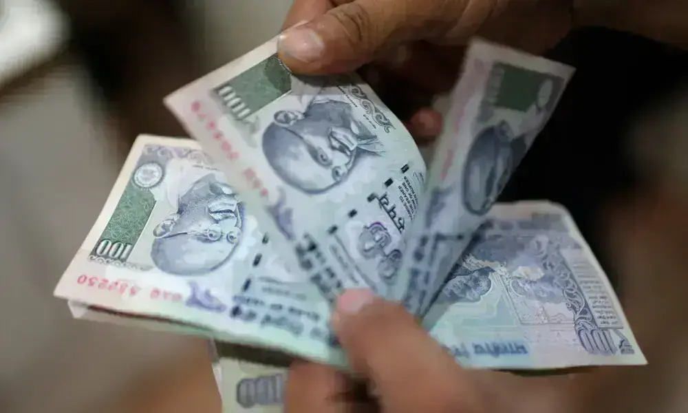 Indian Rupee Drops to Two-Week Low Amid Rising Oil Prices