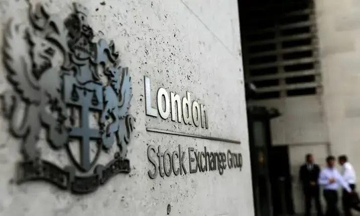 UK stocks close higher as weaker sterling boosts export-heavy sectors