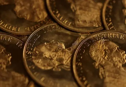 Gold rebounds from one-week low as dollar slips