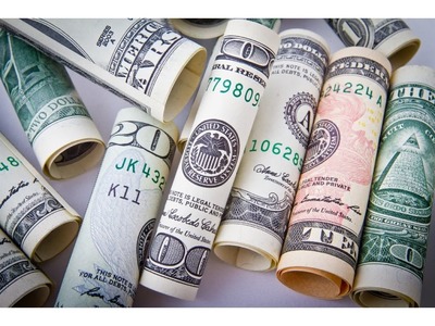 Dollar slightly higher as geopolitics and virus unsettle the mood