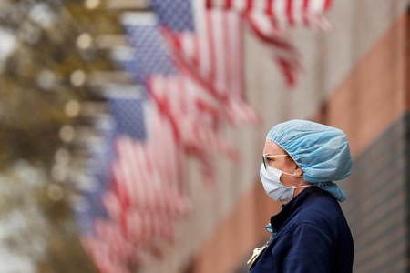 US shatters coronavirus record with over 77,000 cases in a day