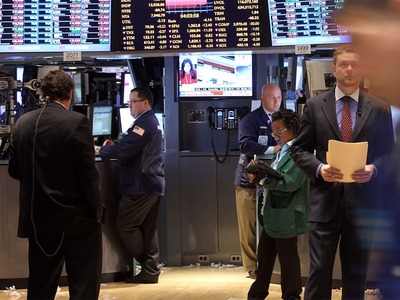 Wall Street closes lower as stimulus deadline nears without deal