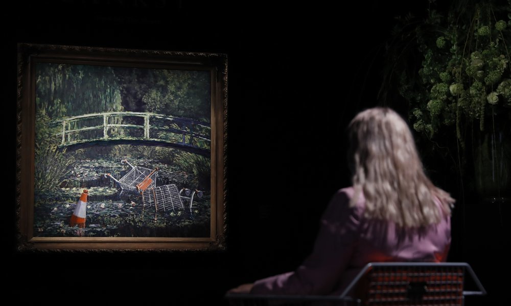 Banksy artwork sells for almost $10 million at auction