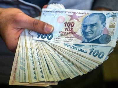 Lira weakens