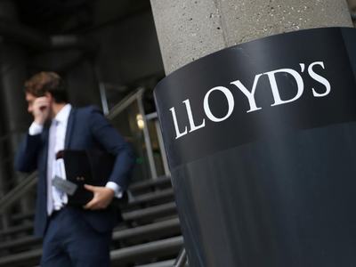 British bank Lloyds swings back to profit