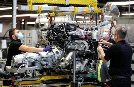 UK factories lose more momentum in October - PMI