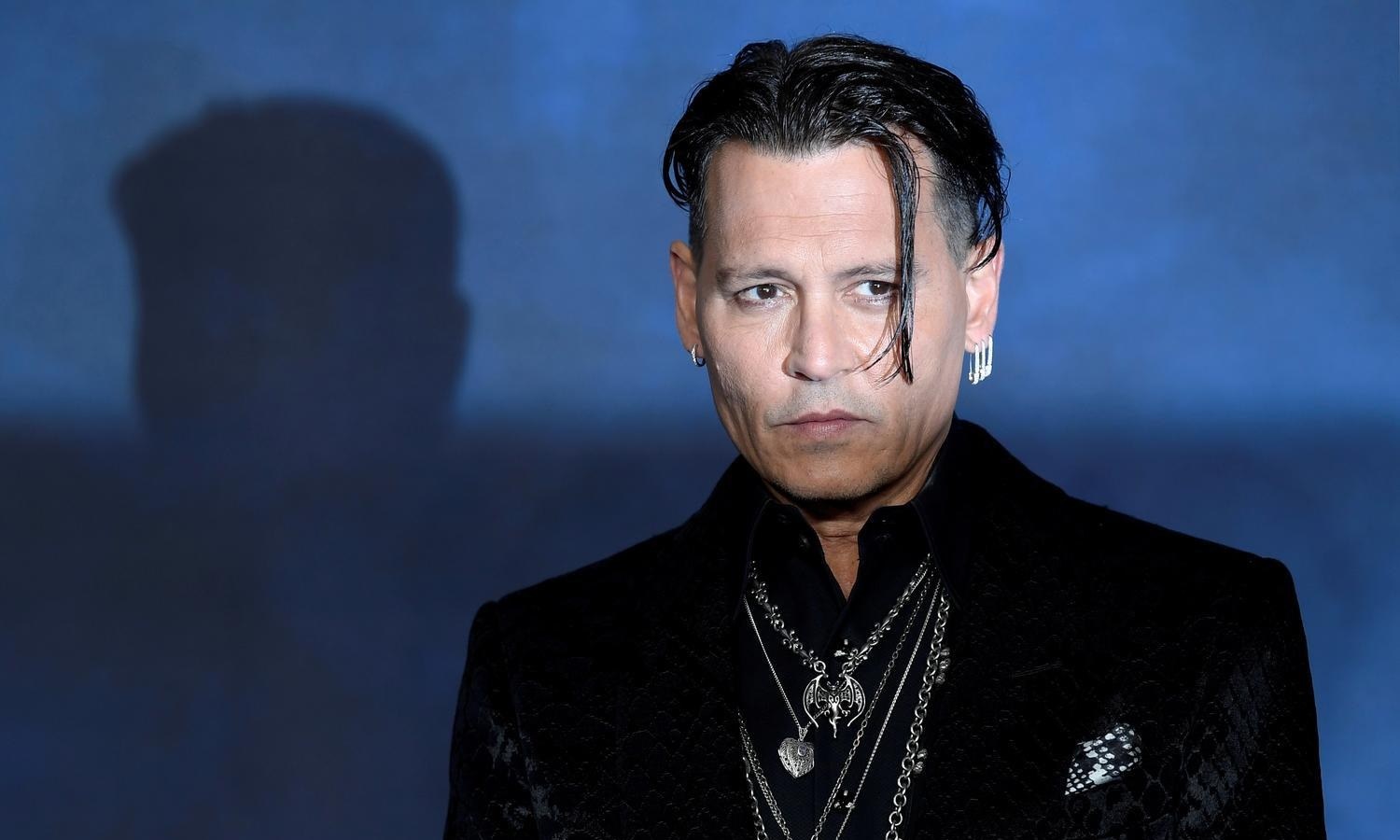 Johnny Depp down but not entirely out after losing 'wife beater' case