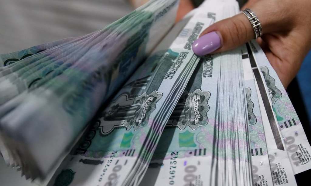 Rouble slips after biggest one-day gain in four years