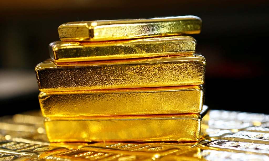 Gold gains on dollar slide as US election drags on