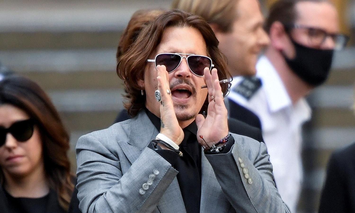 Depp dropped from 'Fantastic Beasts' after losing 'wife beater' case