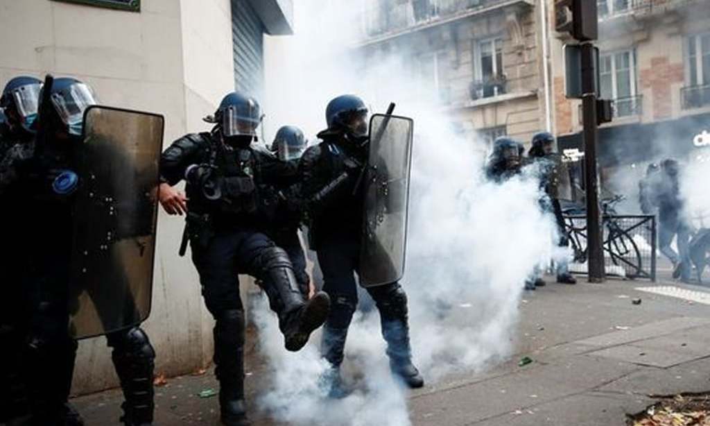 Protesters return to French streets to denounce police violence; tear gas fired
