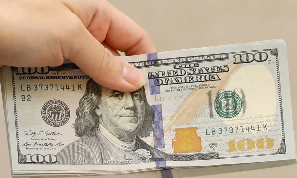 Dollar index near 2 1/2-year low, euro stays above $1.21