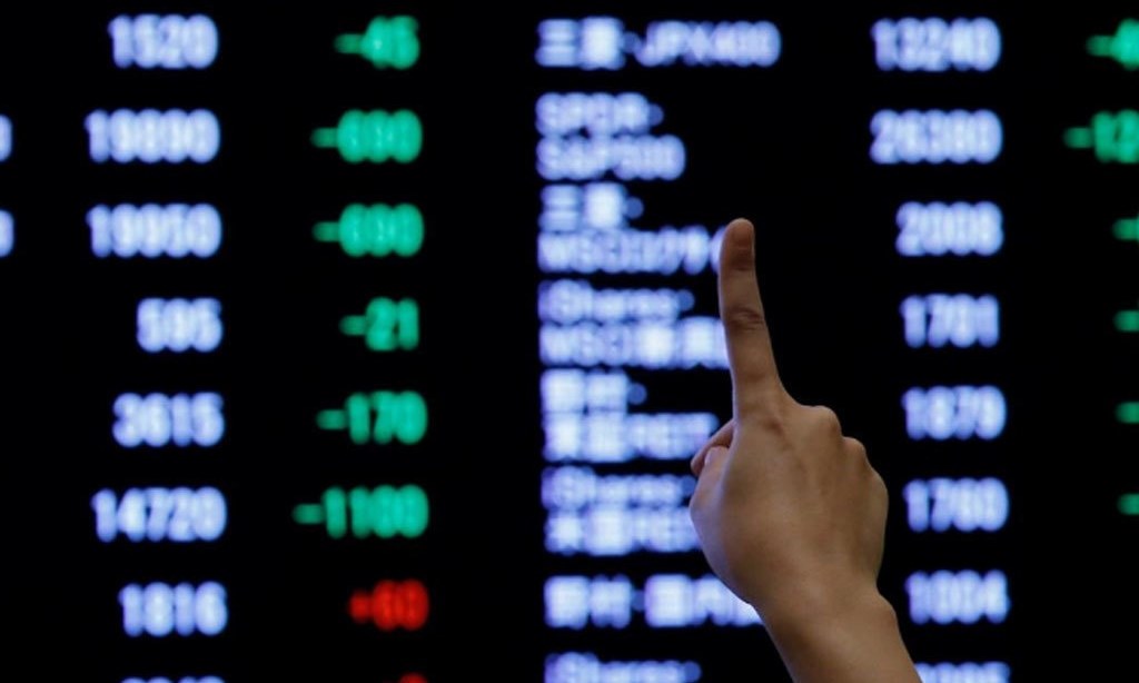 Indonesian shares near 10-month high on vaccine hopes, ringgit slips