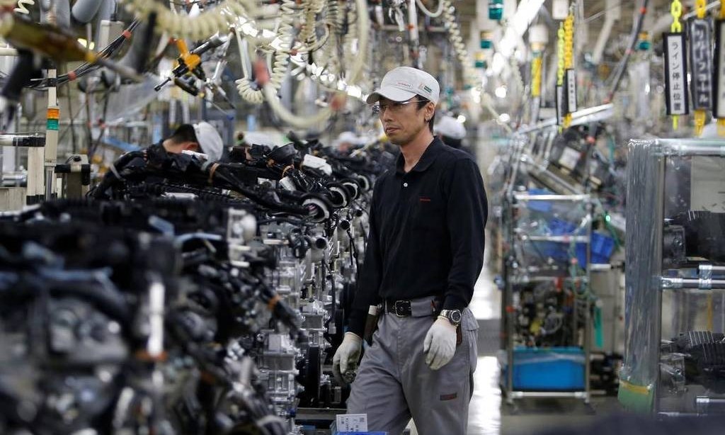 Japanese manufacturers' gloom eases slightly in Dec