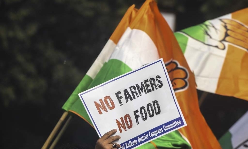India farmers block railway tracks, roads in national action against new laws