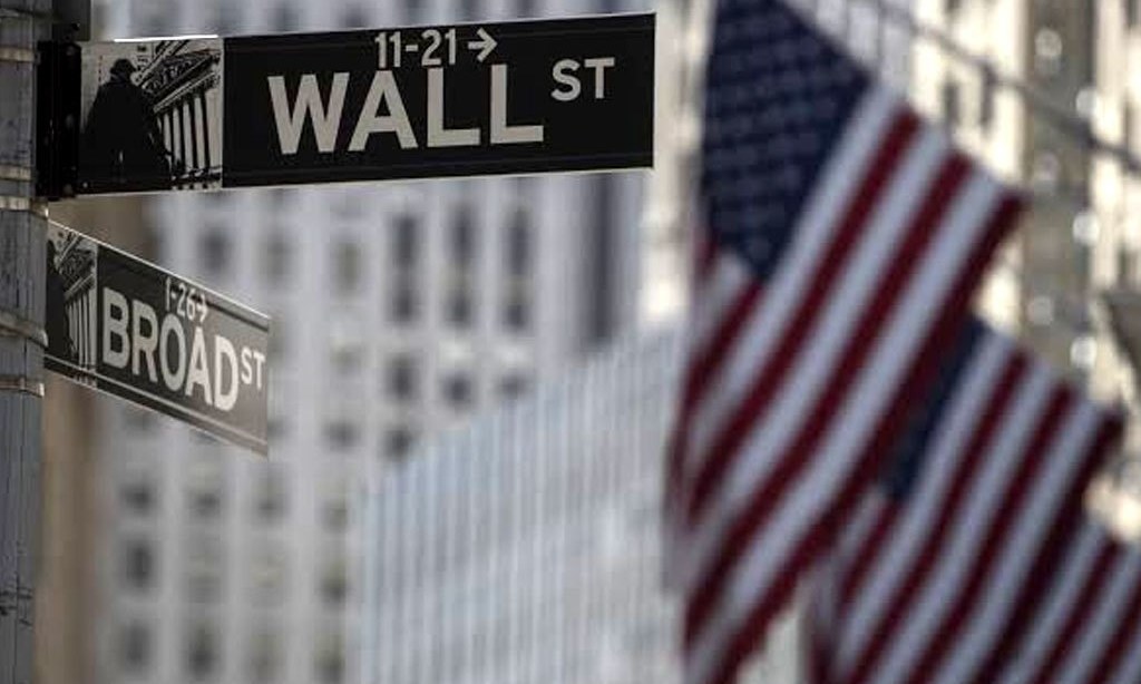 Wall Street dips at open on rising virus cases; eyes on stimulus deal