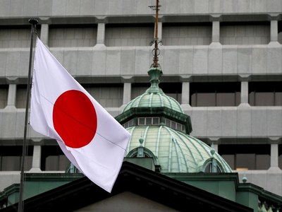 Japan cabinet approves record budget, higher defence spending