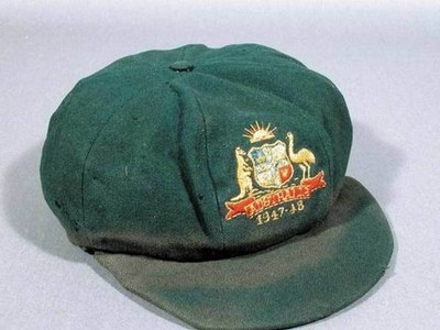 Don Bradman's debut 'baggy green' cap sold for record Aus$450,000