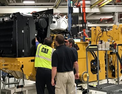 Caterpillar reports lower fourth-quarter earnings Caterpillar reports lower fourth-quarter earnings