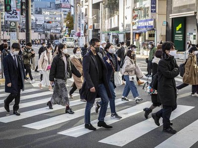 Japan toughens virus measures with new law