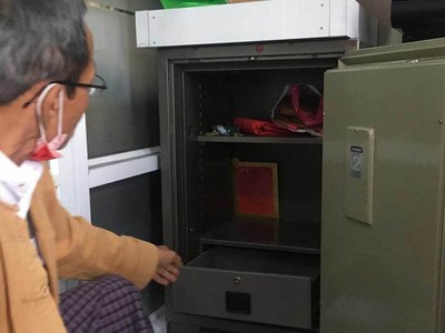 Aung San Suu Kyi's party at a loss after Yangon office raid