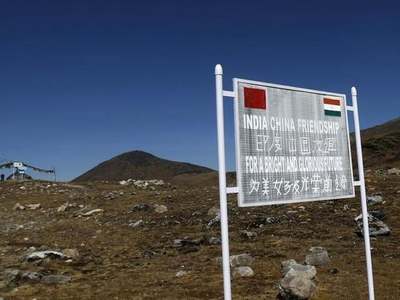India, China agree to pull back troops from disputed Himalayan lake