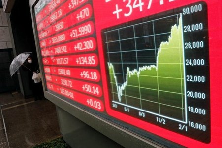 Nikkei back above 30,000 after more than three decades