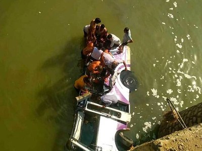 At least 37 dead as Indian bus veers off road into canal